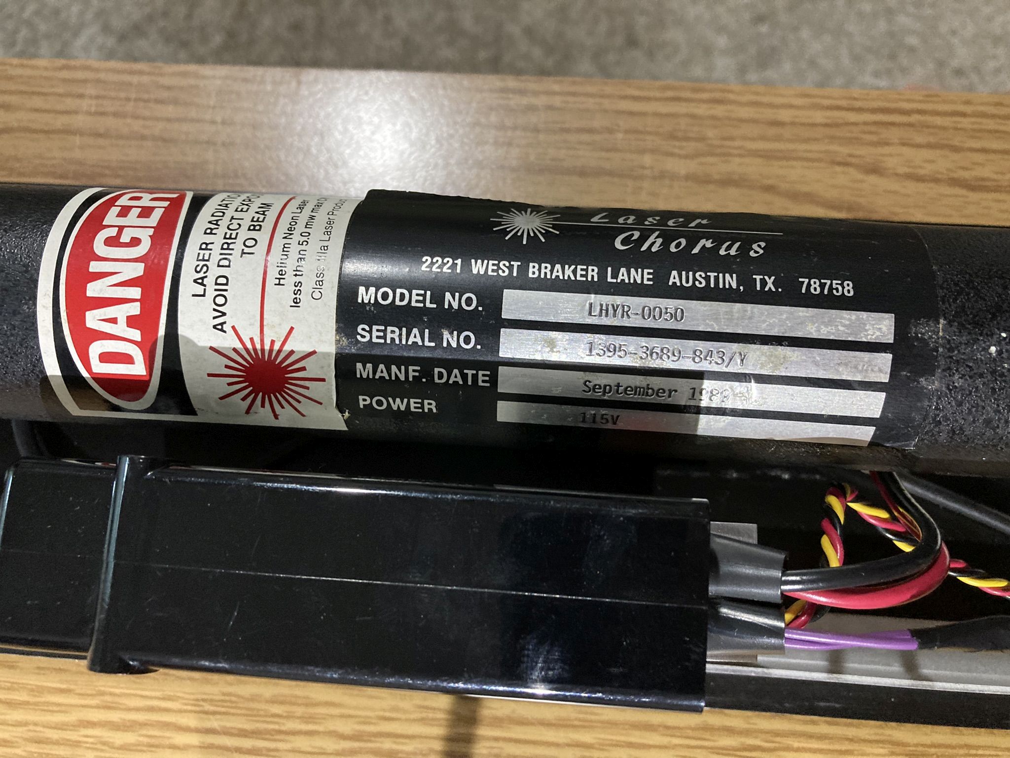 information label on yellow HeNe laser head